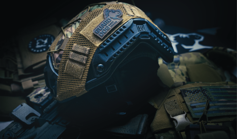 Displayed are several body armor products including a helmet, tactical vest, body armor plates, and molle attachments for gear